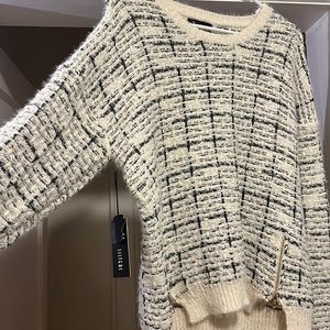 Sisters brand ivory sweater with gold zipper detail